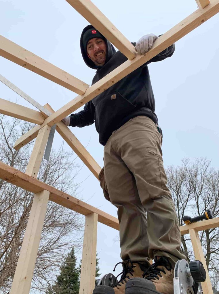 worker building roof